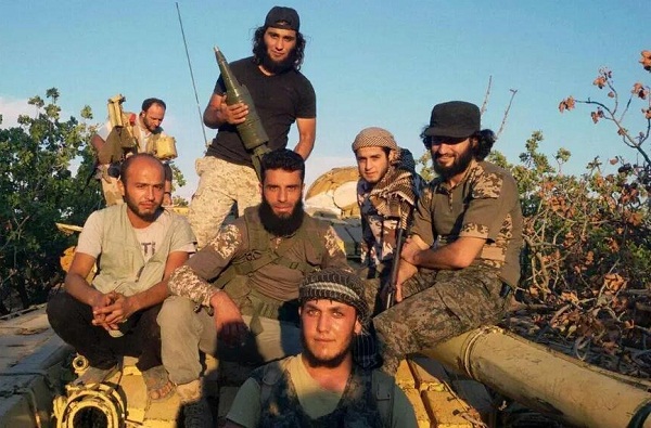 ahrar-al-sham-fighters-with-a-captured-tank-10-7-2015